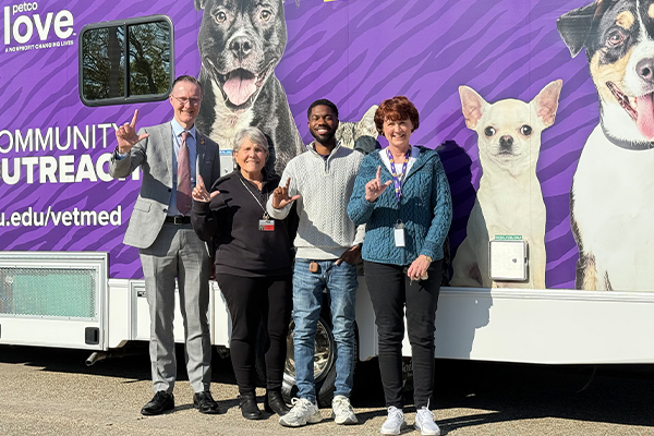 Oliver Garden, Gretchen Morgan, Chris Jones, and Bunnie Cannon with the PetcoLove Outreach vehicle